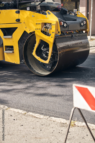 Public city street reconstrunction with heavy machines.