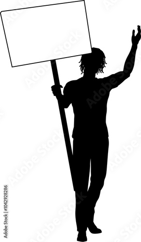 Protestor or demonstrator at a demonstration march, picket line or strike protest rally in silhouette. Holding up a banner or picket sign board placard.