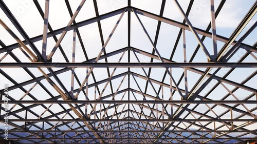 Camera Moving Along The Loopable Steel Roof Truss On A Cloudy Sky Background Construction Building Site Architecture Development Steel Beam Frame Support Framework Seamless Bare Exterior