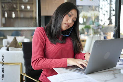 Beautiful confident asian business woman working with laptop Hands typing keyboard. Professional investor working new start up project. business planning in office. Technology business.