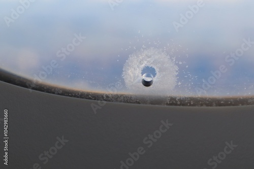 Photos Hole in the airplane window