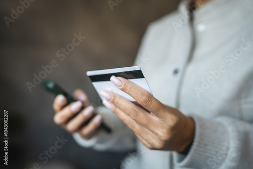 Adult woman use smart phone for online shopping transaction safely