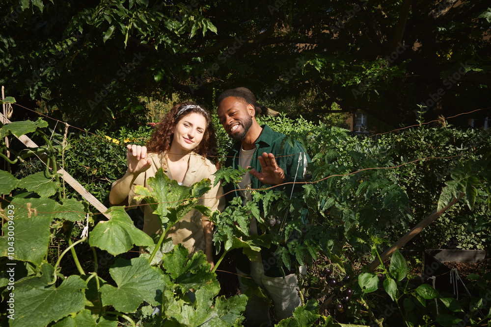 Portrait smiling friends standing amidst plants Portrait smiling friends standing amidst plants