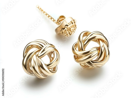 Knot-style gold stud earrings with intricate design. photo