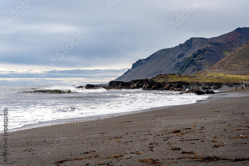 Fascinating Atlantic coast in Iceland with rocks and sea waves from the North Atlantic