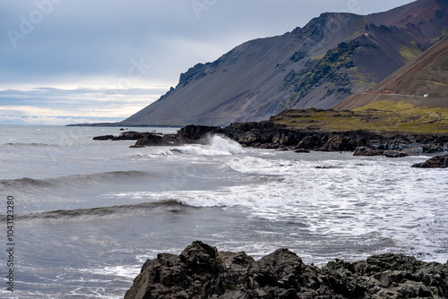 Fascinating Atlantic coast in Iceland with rocks and sea waves from the North Atlantic
