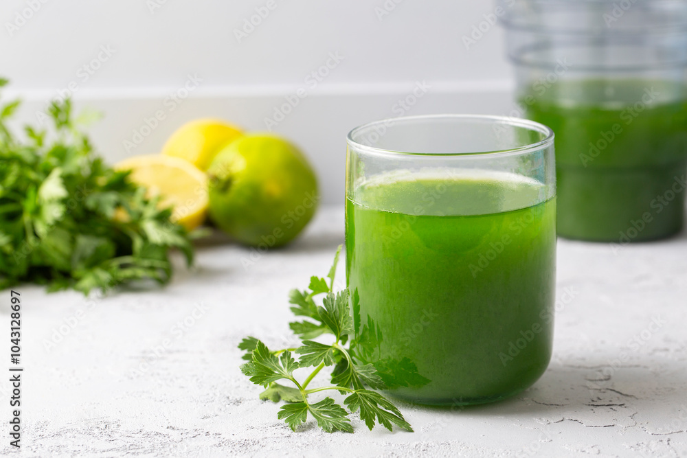Green healthy detox, lemon and parsley juice. Green vegetable smoothie