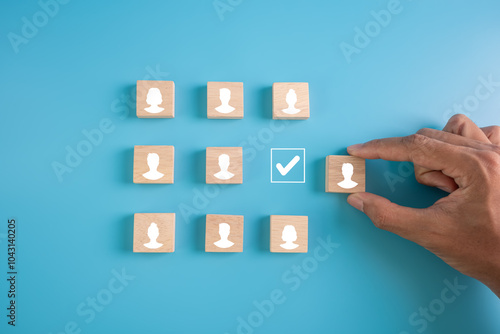 HR hiring recruit job.searching job and business leadership concept.hand holding wooden block with person icon.