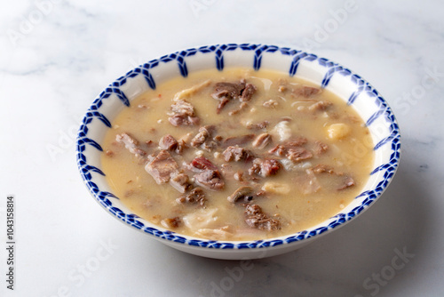 Traditional delicious Turkish food, Turkish traditional tripe soup; iskembe corbasi and offal soup, Turkish Meat Soup Kelle Paca (Turkish name; Kelle paca corbasi) photo