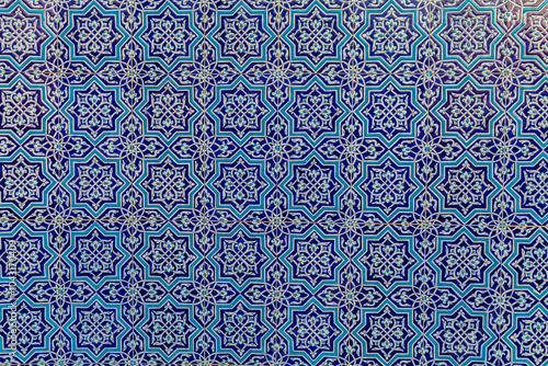 Geometric traditional Islamic ornament. Fragment of a ceramic mosaic.Abstract background.