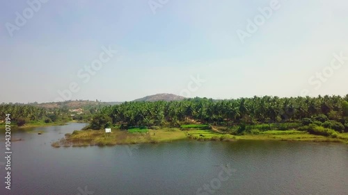 Drone view of Ramanagara Lake with hills at background in Karnataka, India. photo