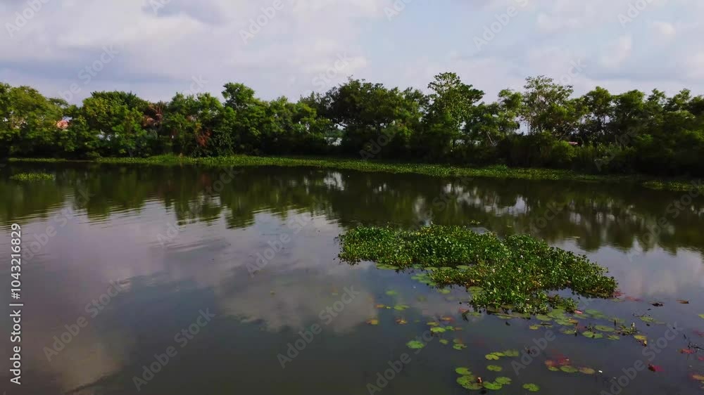 Beautiful low aerial of the Jabi reservoir, a stunning man-made lake in the capital city of Abuja, Nigeria Beautiful low aerial of the Jabi reservoir, a stunning man-made lake in the capital city of Abuja, Nigeria