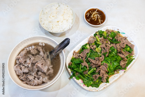 Fresh beef soup, and stir fry green vegetables and beef in Tainan, Taiwan photo