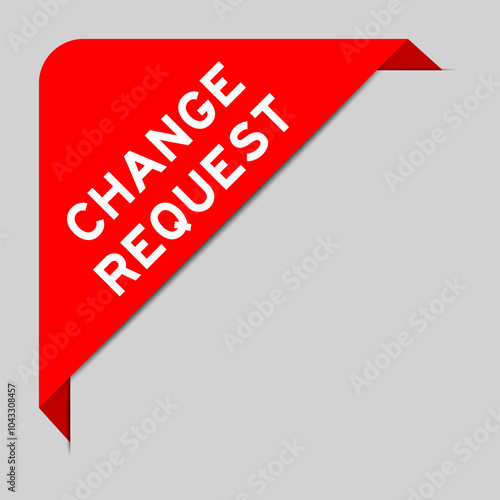 Red color of corner label banner with word change request on gray background