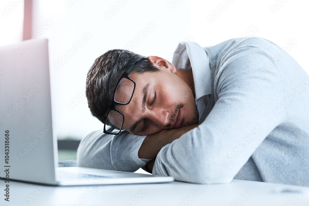 Tired businessman, sleeping and rest with laptop on desk for lazy day, done or finished at office. Young, man or employee asleep on table with computer for fatigue, burnout or dreaming at workplace Tired businessman, sleeping and rest with laptop on desk for lazy day, done or finished at office. Young, man or employee asleep on table with computer for fatigue, burnout or dreaming at workplace