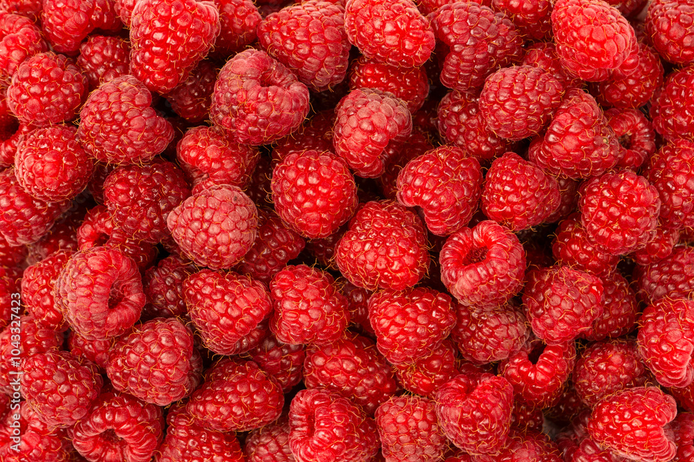 Tasty fresh raspberry as a background. Tasty fresh raspberry as a background.