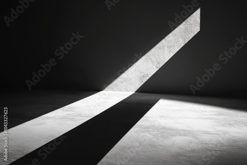 A sharp, angular structure casting a long, dark shadow, symbolizing the sharp divisions and rigid structures within alt-right beliefs. photo