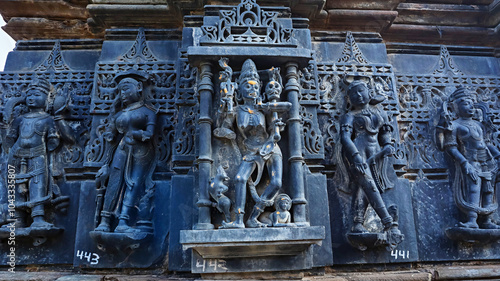 Carved sculptures of Goddess Chamunda and other Hindu deities, HanumanGarhi Temple, Arthuna Group of Temples, Banswara, Rajasthan, India. photo