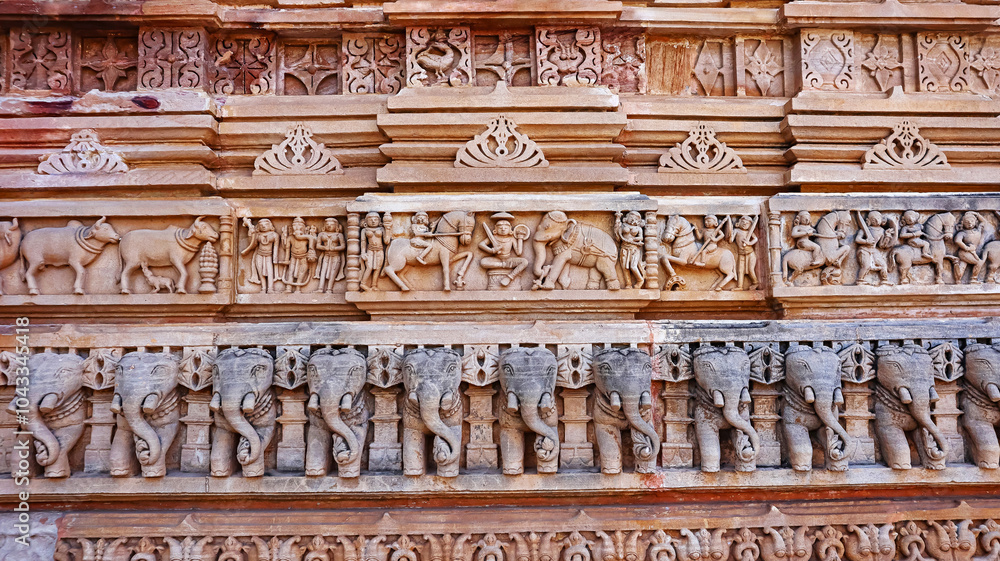 Carving Panels of Elephants and Warriors on the Shamlaji Vishnu Temple, Aravalli District, Gujarat, India. Carving Panels of Elephants and Warriors on the Shamlaji Vishnu Temple, Aravalli District, Gujarat, India.