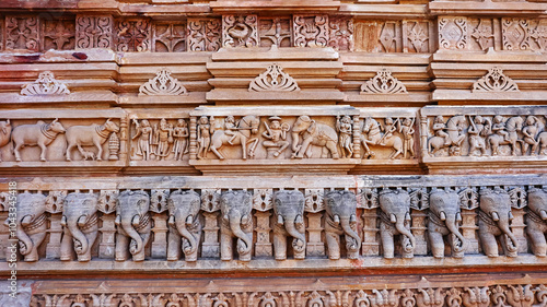 Carving Panels of Elephants and Warriors on the Shamlaji Vishnu Temple, Aravalli District, Gujarat, India. photo