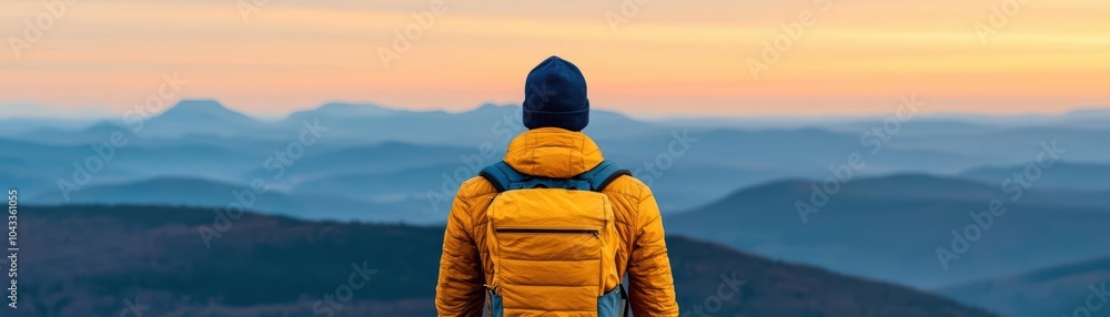 Backpacker at the top of a cliff, vast uncharted landscape stretching out below, backpacker exploration landscape Backpacker at the top of a cliff, vast uncharted landscape stretching out below, backpacker exploration landscape