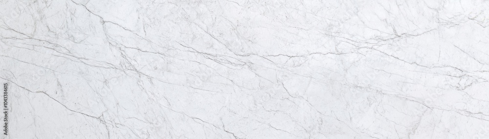 Obraz premium A beautiful white marble surface featuring elegant veins and a smooth texture, perfect for background designs, interiors, or artistic projects.