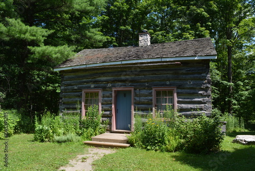 A log blacksmith's house built in the early 19th century in Canada.