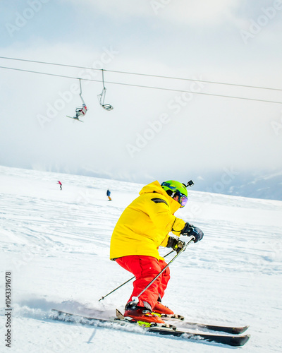 Young teenager kid wear warm clothes ski downhill in alps in winter ski resort in snowy day. Exercise and active lifestyle in winter concept photo