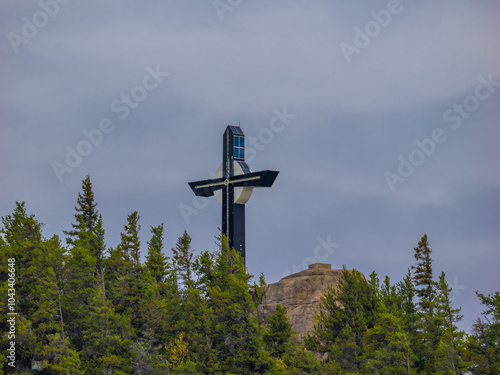 Cross marking the highest point of the famous Eucher hiking trail (Sentier Eucher), La Baie, Saguenay Fjord, Quebec, Canada