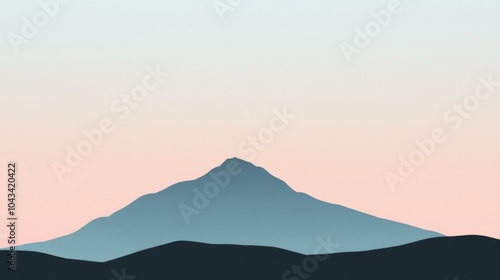 A silhouette of a mountain range against a pastel pink and blue sky.