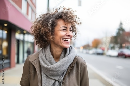 Portrait of a beautiful young woman with afro hairstyle laughing