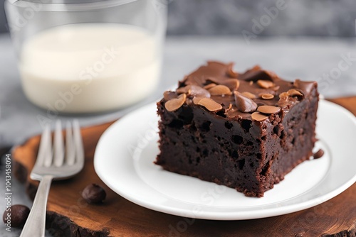 Single brownie cake on a white plate