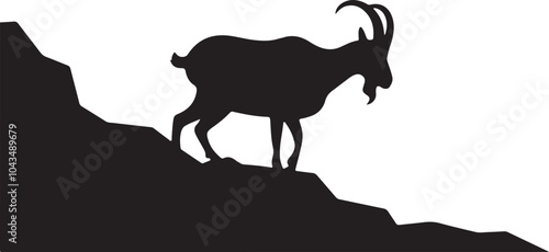 Mountain Goat on a Rocky Cliff Silhouette