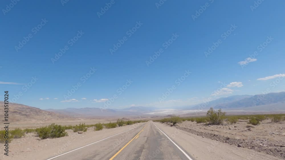 Driving alone in the desert of Death Valley. California, USA. Driving alone in the desert of Death Valley. California, USA.