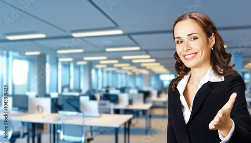 Free Download Portrait of smiling businesswoman business woman wear confident suit giving hand for handshake, stand against office background. Business success ad concept. Copy space for ad text place. Banner image - GFXLoad