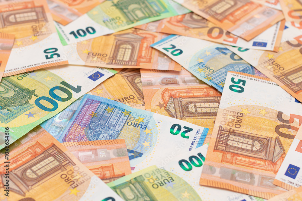 Fototapeta premium Different Euro Banknotes Money Background. Euro Money Currency. Colored Paper Money. A Lot of Fifty Euro Bills. Business, Finances, Cash and Money Saving Concept