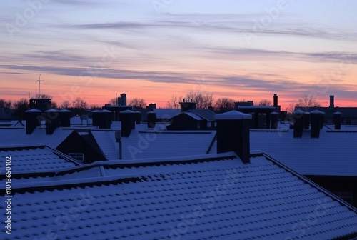 _ . Snowy Rooftop Outlines A dusting of snow highlights the cont photo