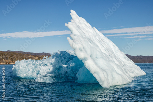 View of glaciers and icebergs in the fjords of South Greenland.