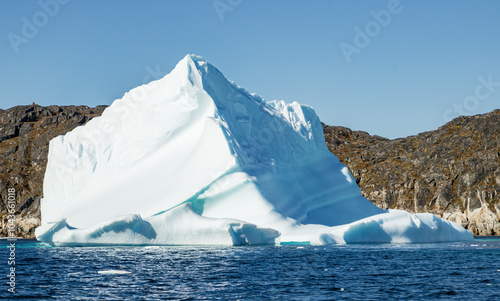 View of glaciers and icebergs in the fjords of South Greenland.