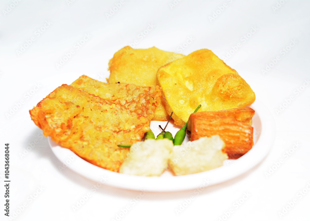 Indonesian fried snacks made from tempeh, sweet potato, cassava and sago Indonesian fried snacks made from tempeh, sweet potato, cassava and sago