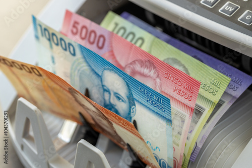 Photos Chilean pesos counted in cash counting machine