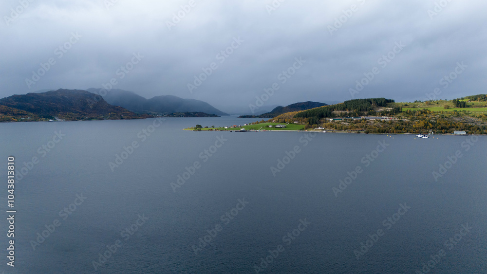 Serene Fjord Landscape with Village and Mountains Serene Fjord Landscape with Village and Mountains
