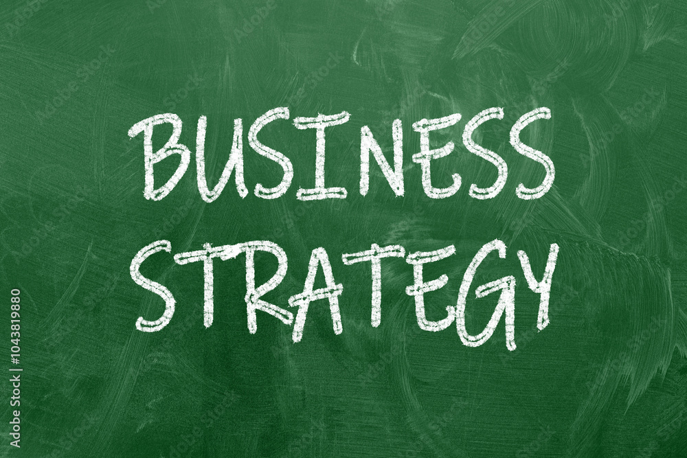 Close up of business strategy flow chart on blackboard. Close up of business strategy flow chart on blackboard.