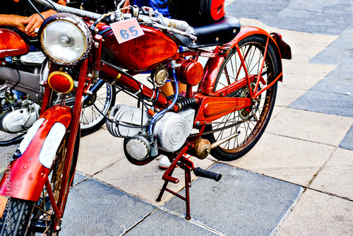 Red motorcycle, classic motorcycle exhibition in the city of Igualada, Barcelona photo