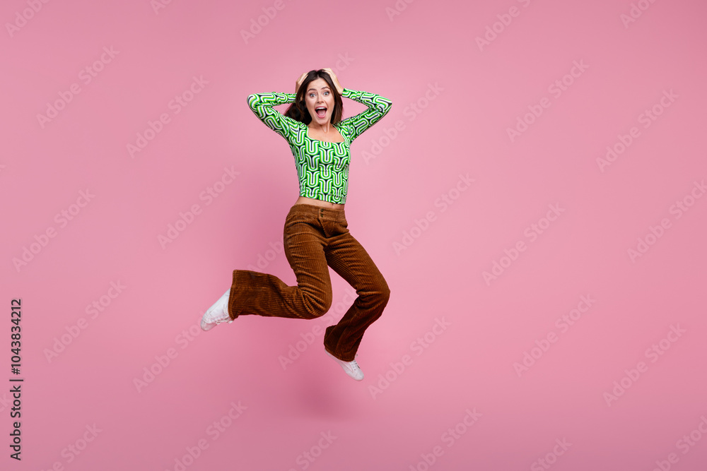 Φωτογραφία Photo of charming adorable cheerful woman hand touch head jump up wear green sty