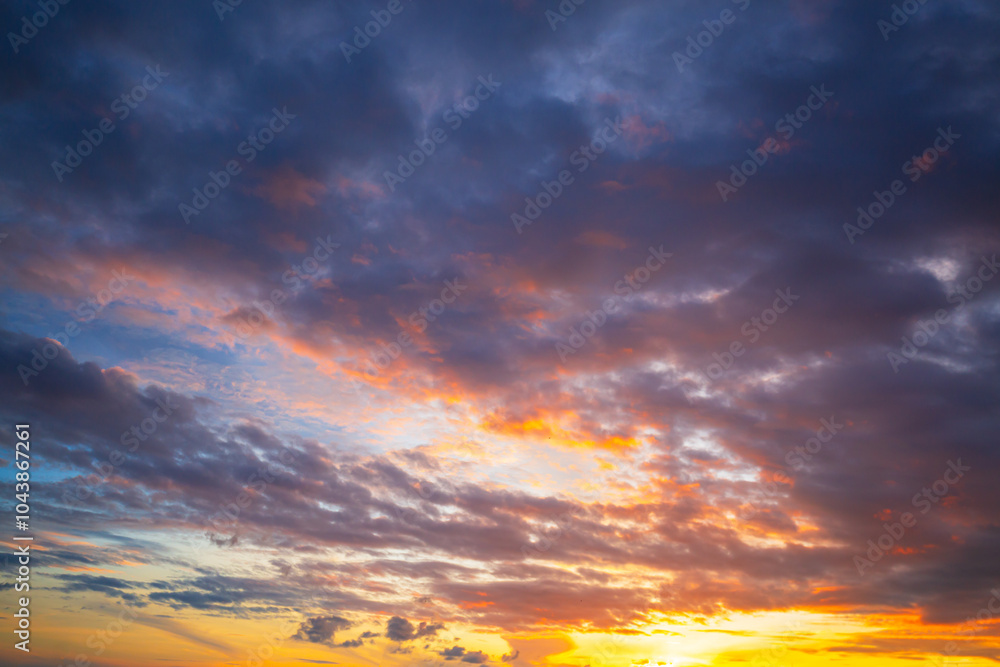 Obraz premium Morning clouds and sky,Panorama sunset sky and cloud background,Orange sky and clouds background,Background of colorful sky concept, amazing sunset with twilight sky and clouds 