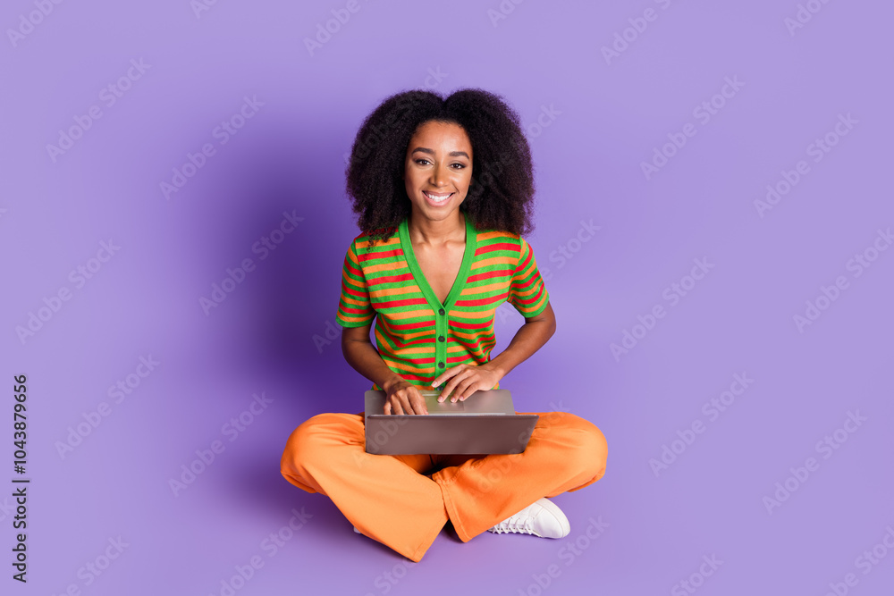 Full length photo of cheerful pretty lady dressed striped cardigan communcating modern gadget empty space isolated purple color background Full length photo of cheerful pretty lady dressed striped cardigan communcating modern gadget empty space isolated purple color background