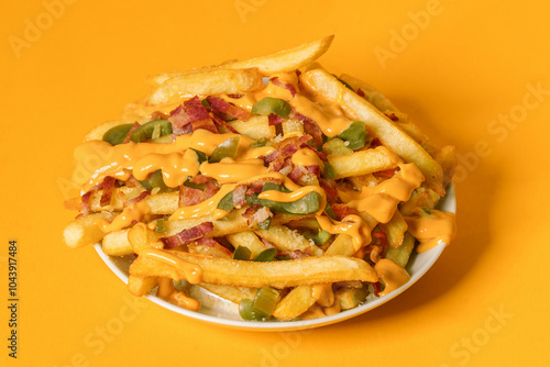 Canvas Print Crispy French fries loaded with bacon, cheese sauce and jalapeno pepper