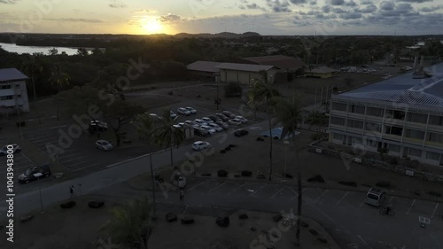 Drone flies over Dreyfus Tower and up into the sunset in Kourou, French Guiana, France photo