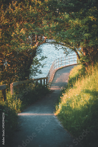 spring danish walking path with flowers and greenery photo